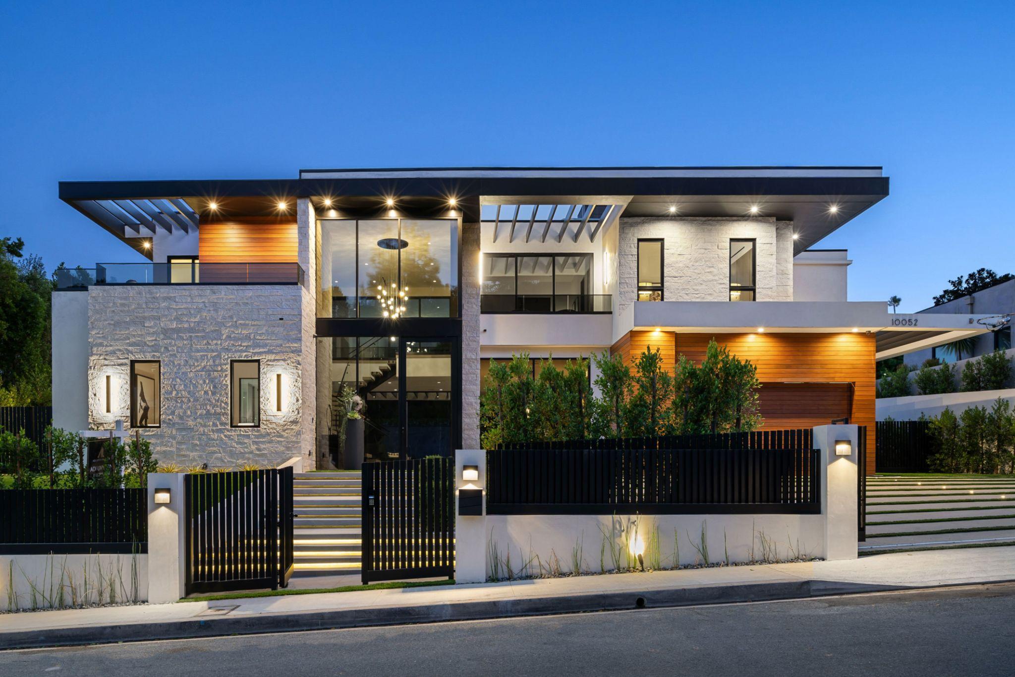 Modern luxury residence with architectural lighting at dusk